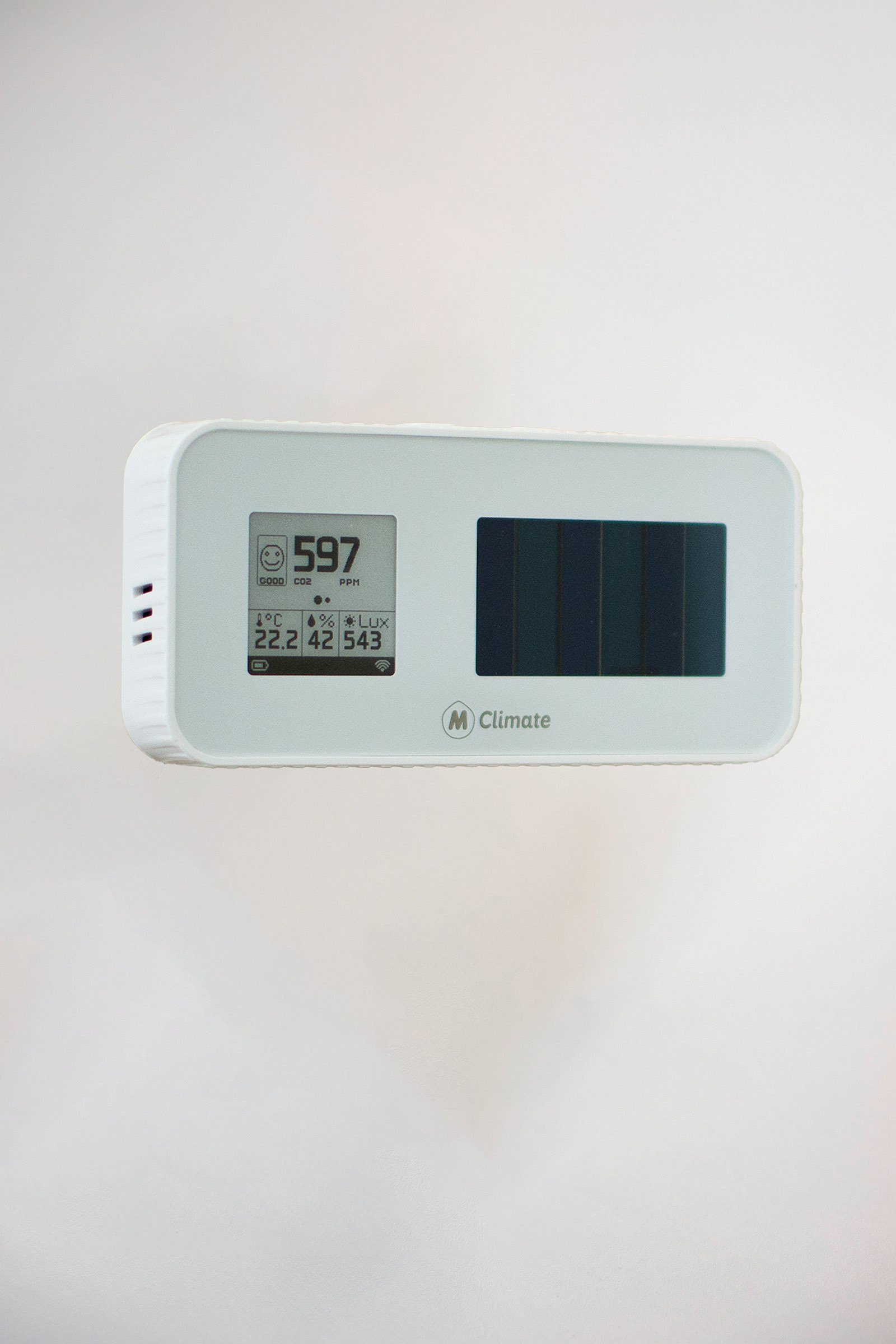 MClimate CO₂ sensor with a digital display and an integrated indoor solar cell
